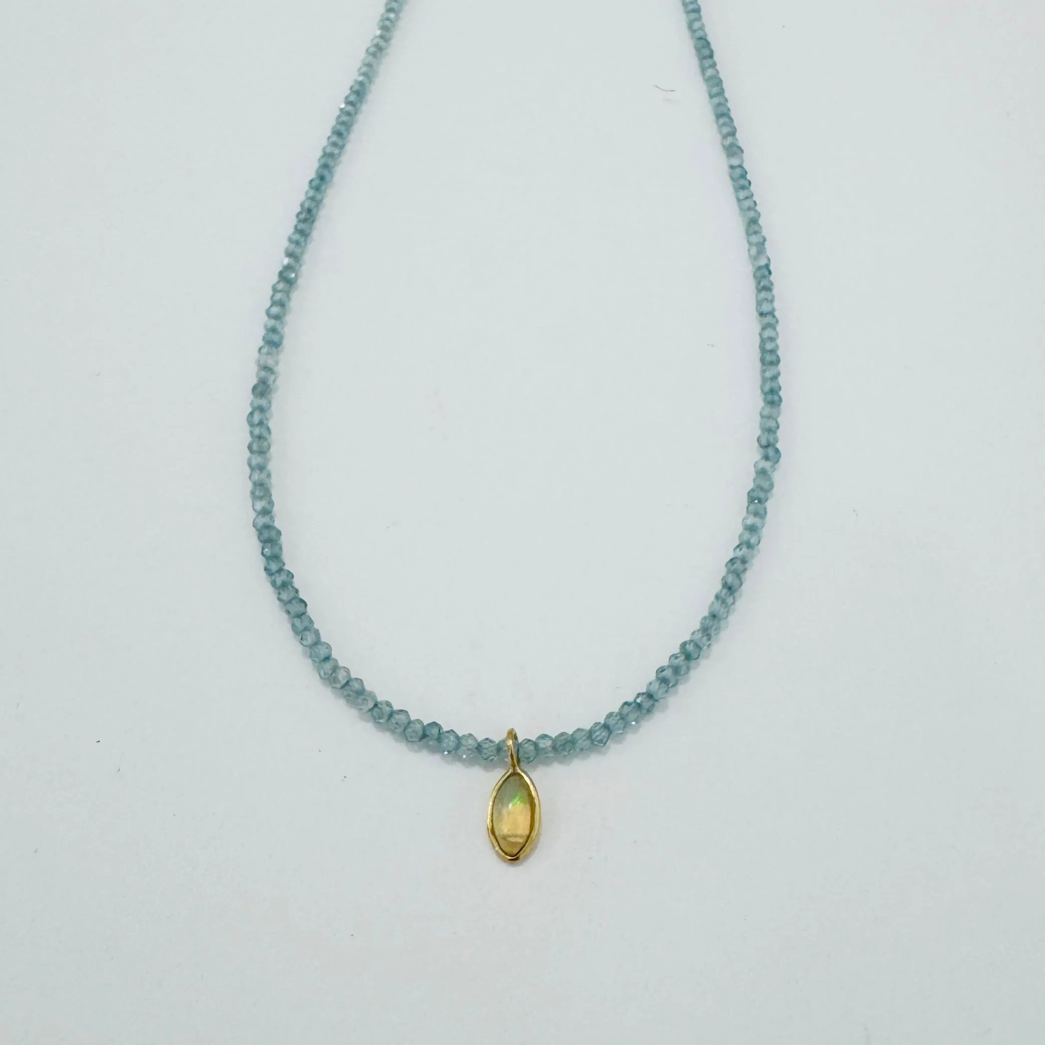 delicate gemstone necklace with opal charm sold by Theodosia