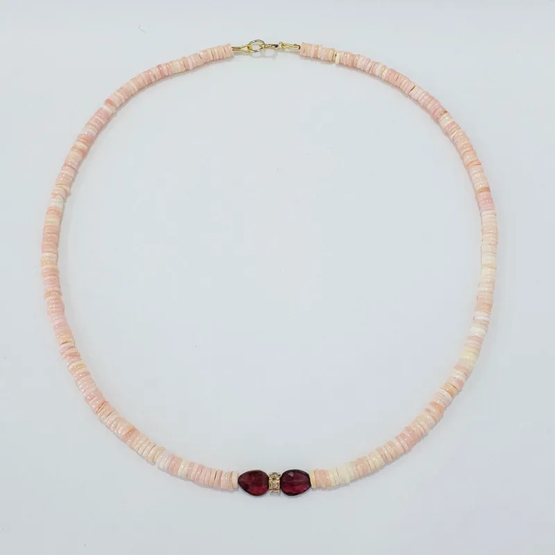 conch, garnet, and diamond barrel bead made by Theodosia