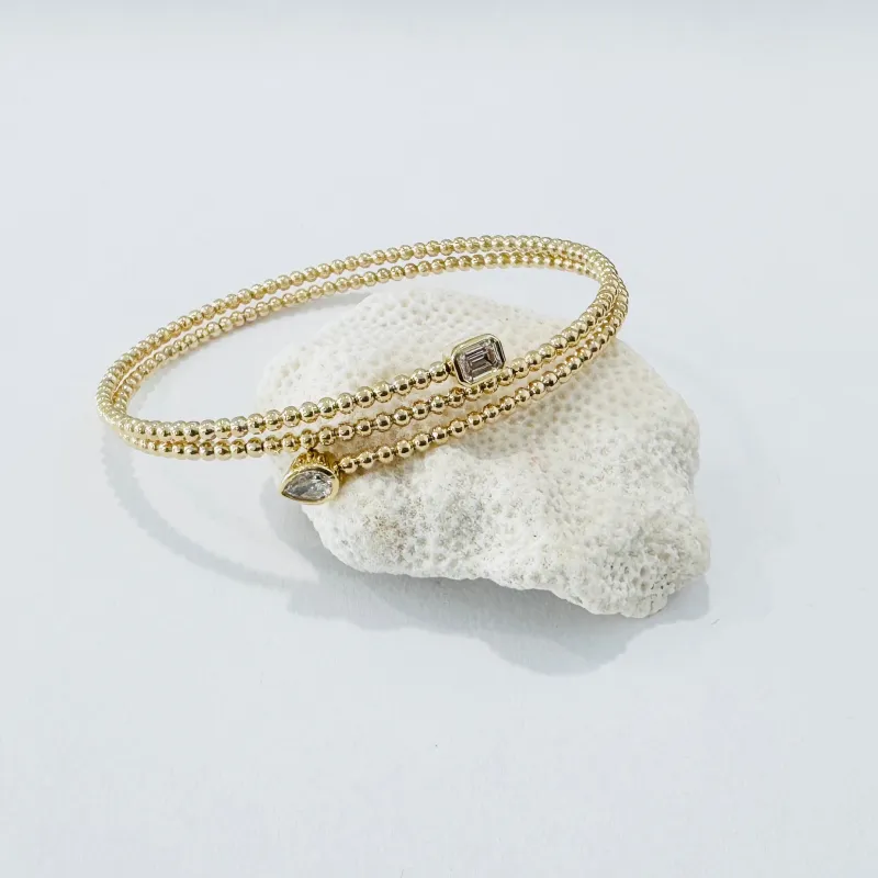 emerald and pear cut diamond bubble flex wrap bracelet made by Theodosia