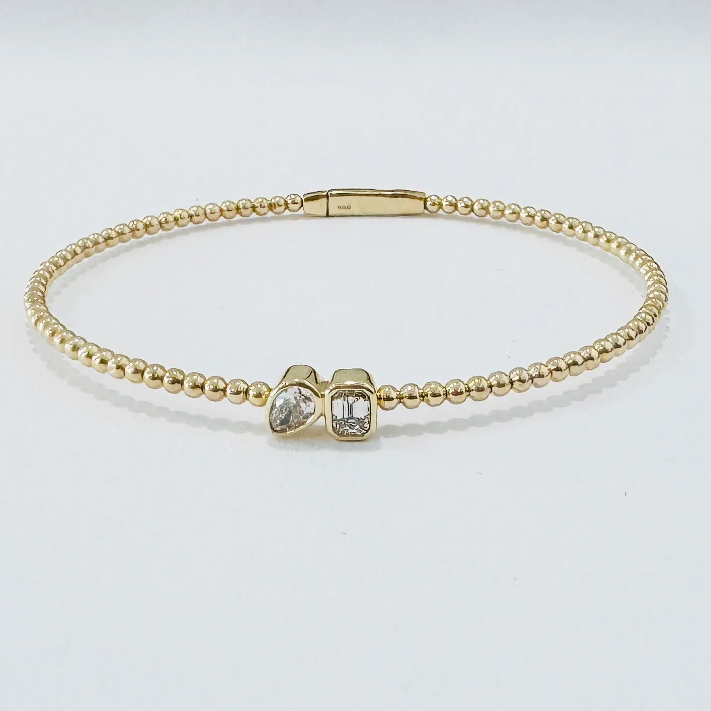 emerald and pear cut diamond bubble flex bracelet sold by Theodosia
