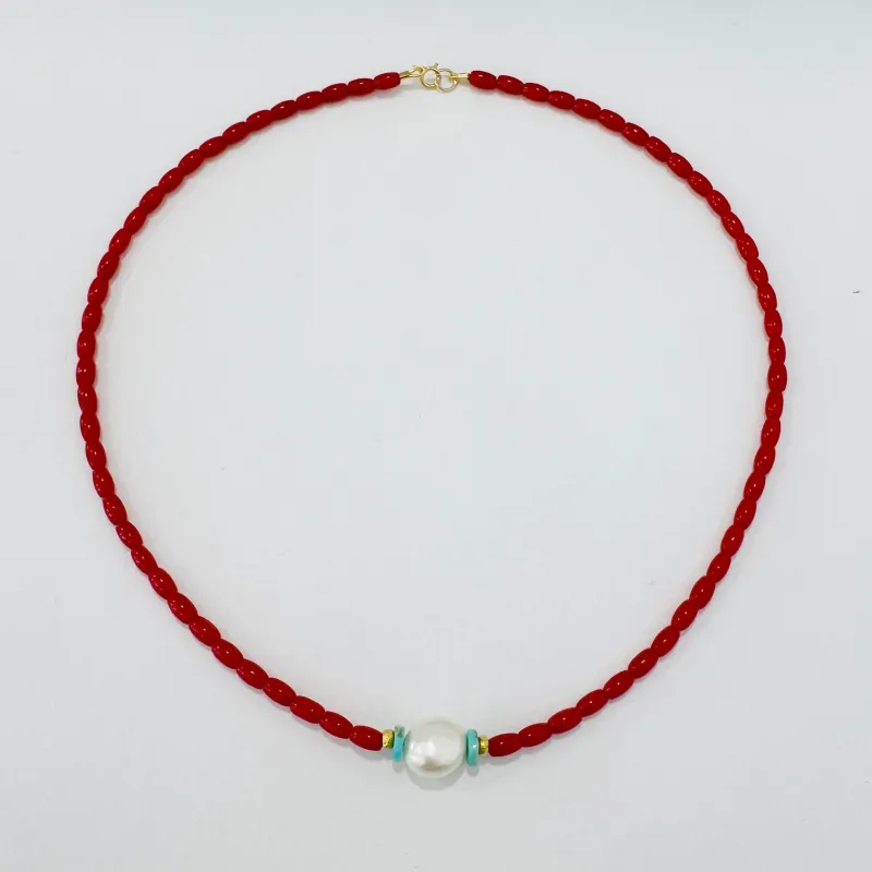 coral, turquoise, pearl, and gold beads made by Theodosia