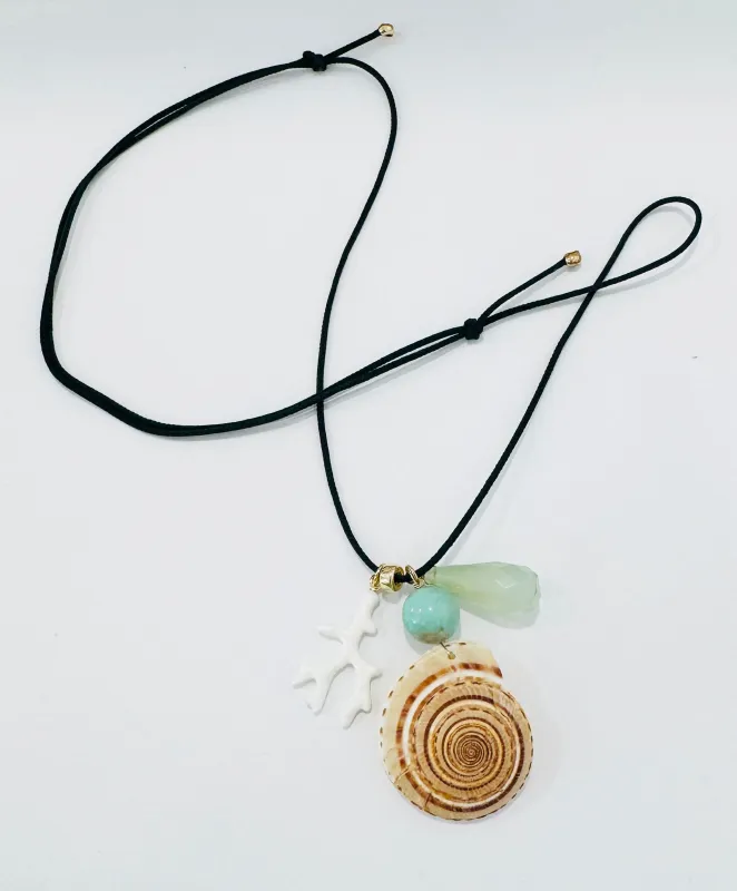 Kumihimo silk cord charm necklace, teal with blue chalcedony, enamel coral, and snail shell made by Theodosia