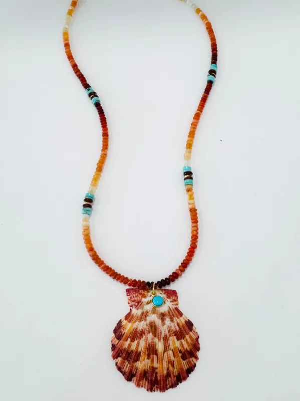 shaded fire opal, turquoise, and garnet necklace with shell pendant made by Theodosia