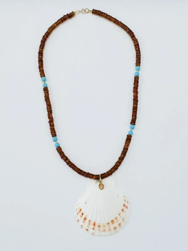 Hessonite garnet and turquoise necklace with shell pendant made by Theodosia