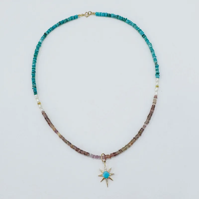 Turquoise starburst on Zircon, pearl, and turquoise Turquoise starburst on zircon, pearl, and turquoise made by Theodosia