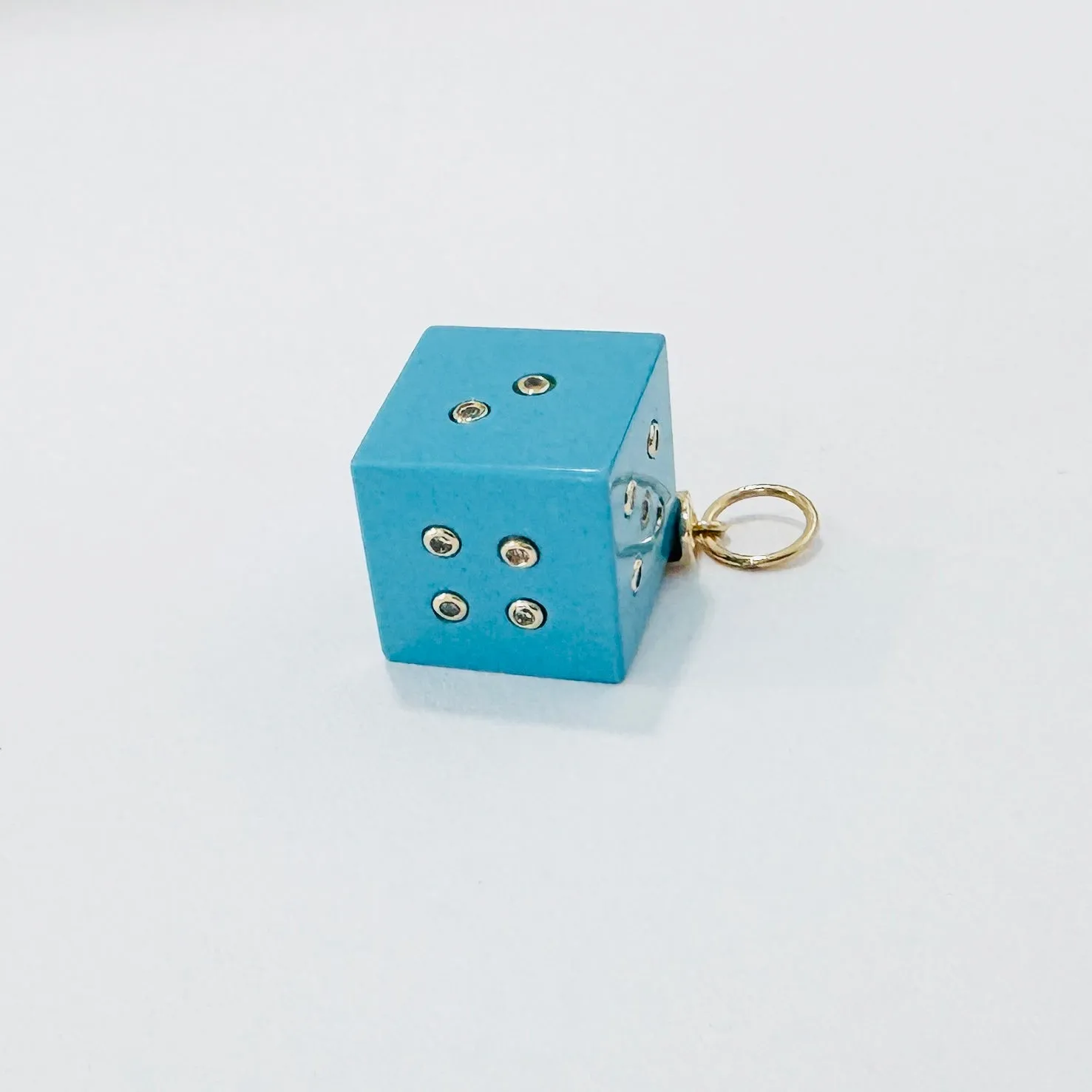 Dice pendant sold by Theodosia