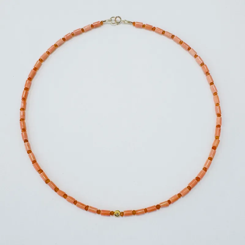 mini tube coral necklace with diamond bead made by Theodosia