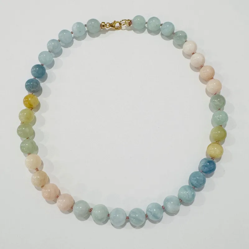 knotted gumball shaded morganite necklace made by Theodosia