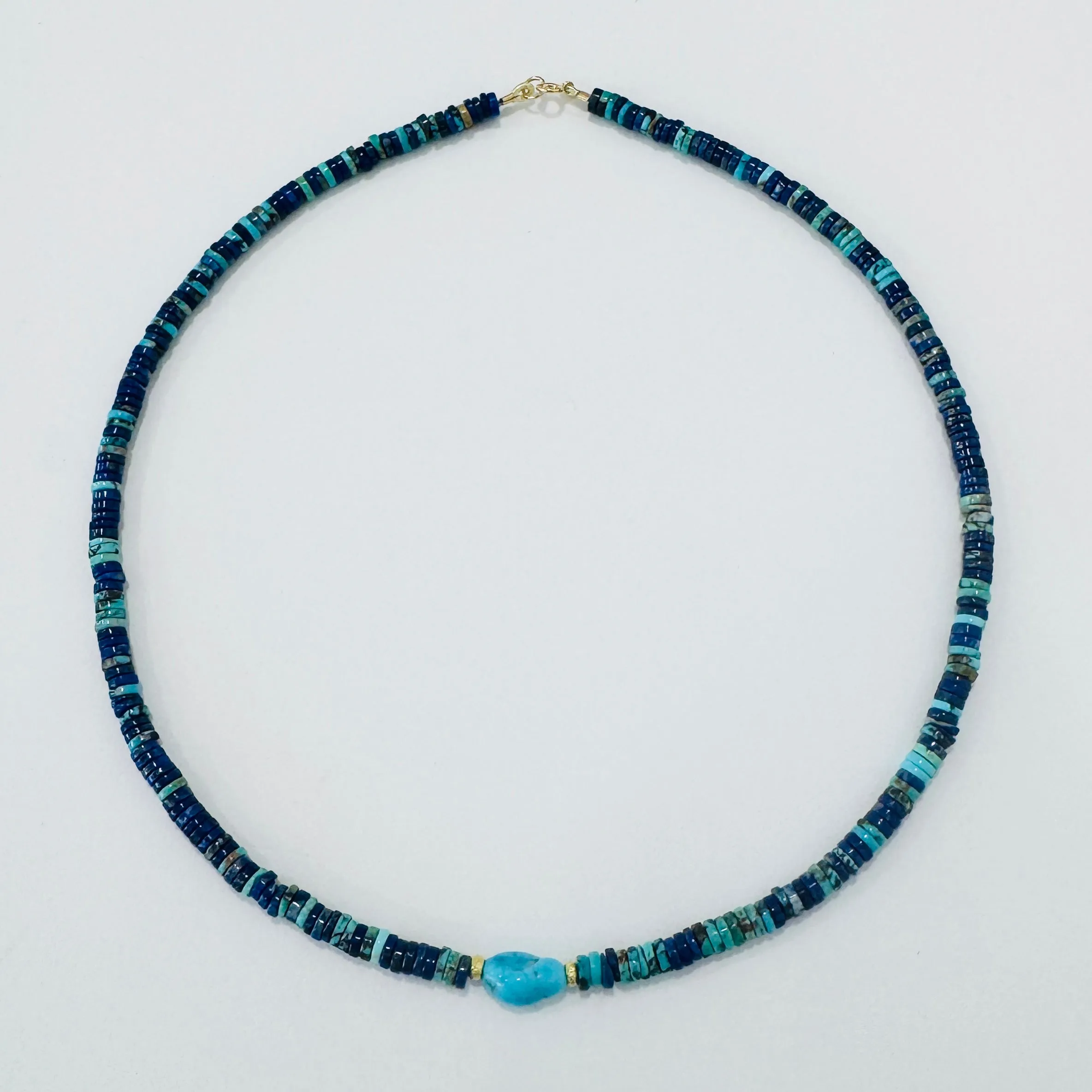 lapis, turquoise, and gold beads sold by Theodosia