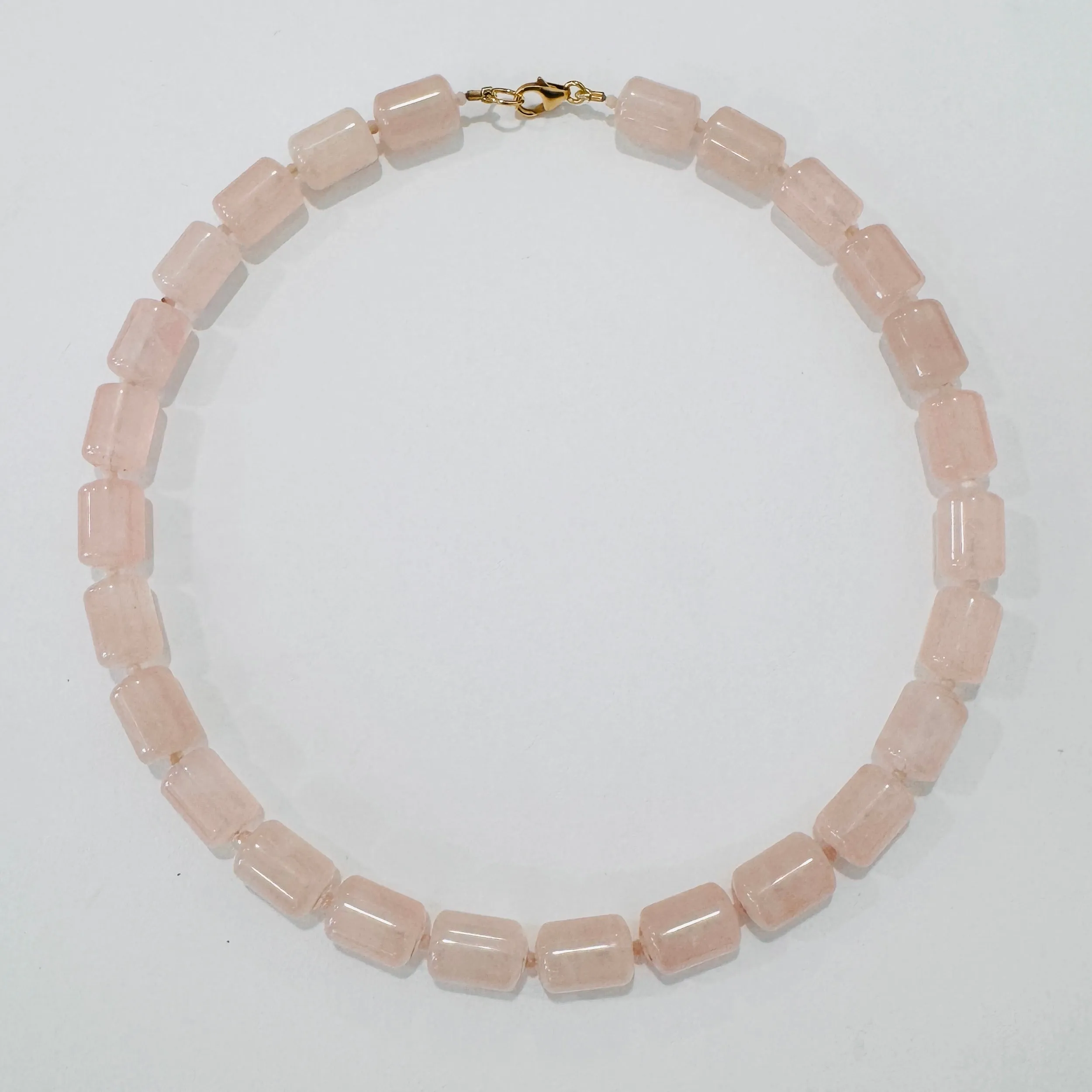 rose quartz tube necklace sold by Theodosia