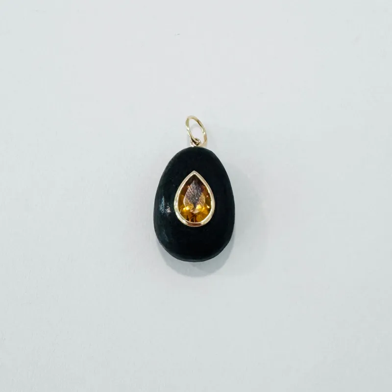 bezel set teardrop citrine on wood made by Theodosia