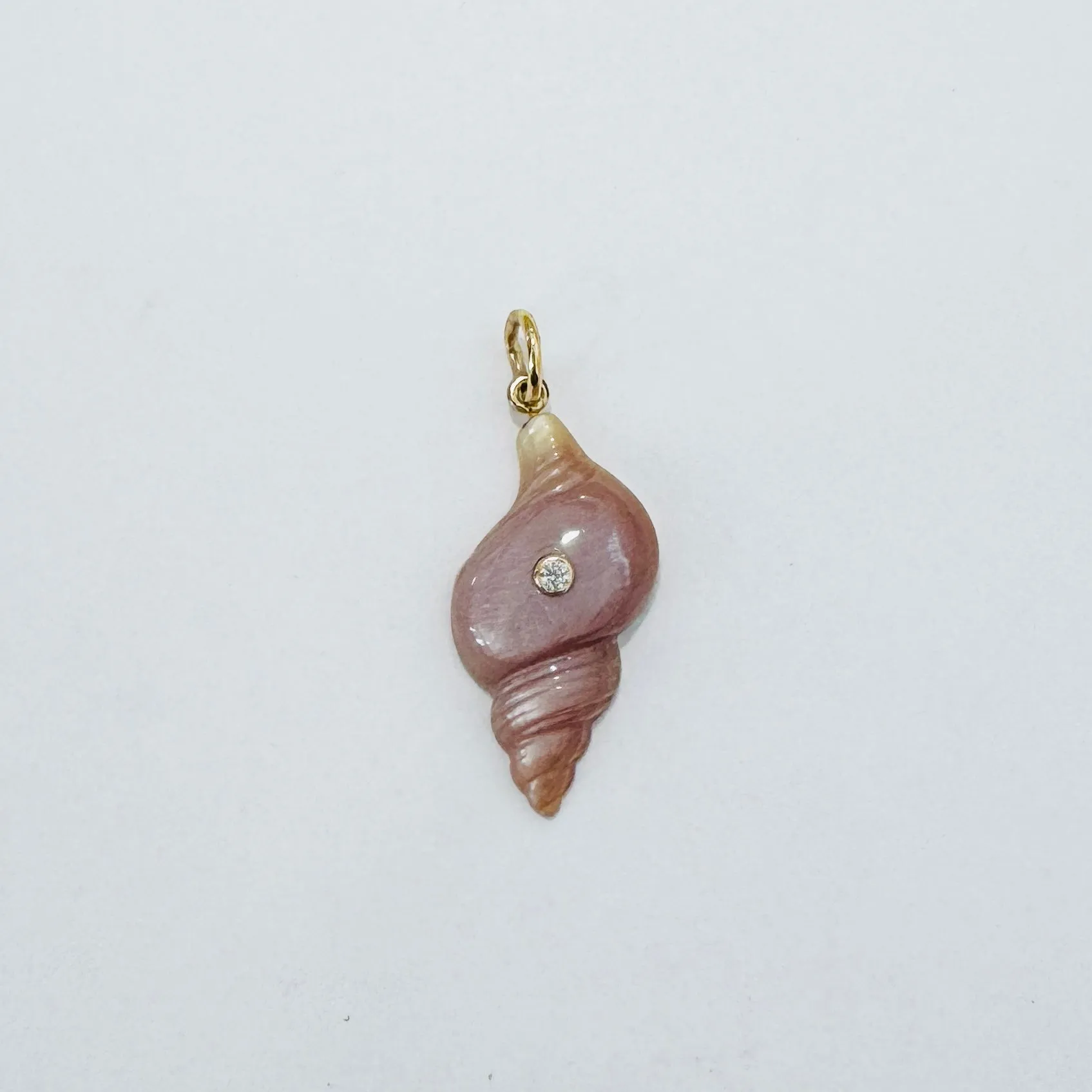 Peach moonstone conch pendant with bezel diamond sold by Theodosia
