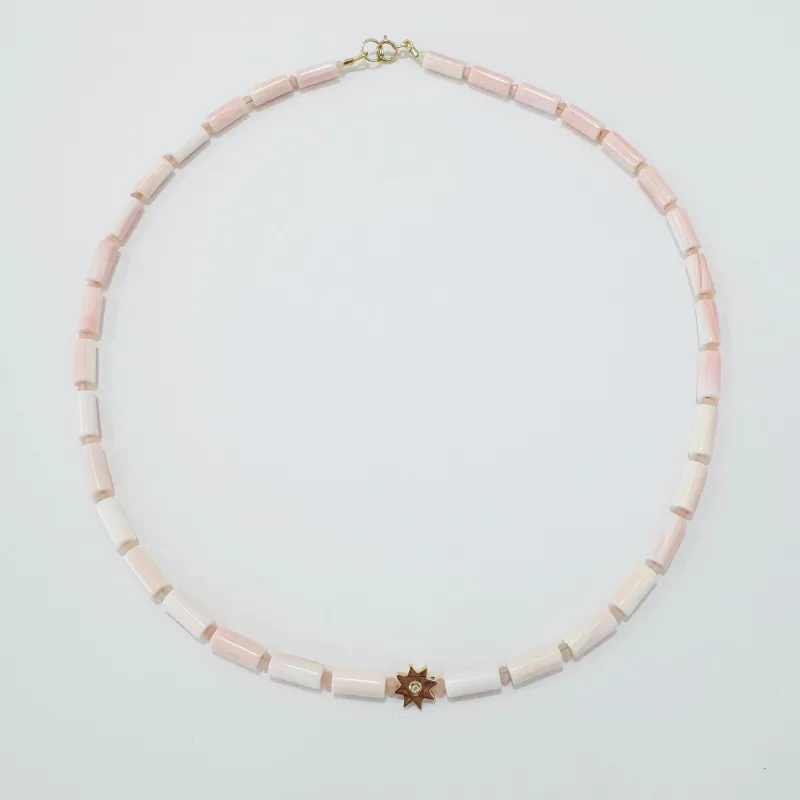 tube pink conch necklace with starburst diamond bead made by Theodosia