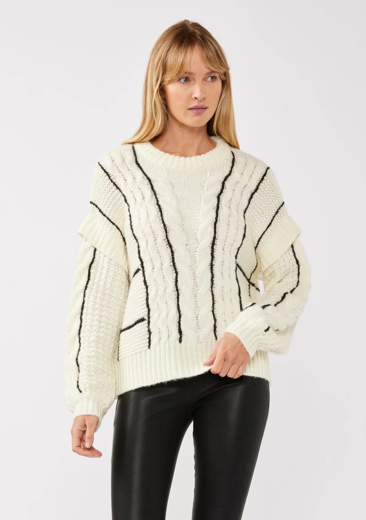 The Yvaine Striped Cable Sweater sold by Thread & Seed