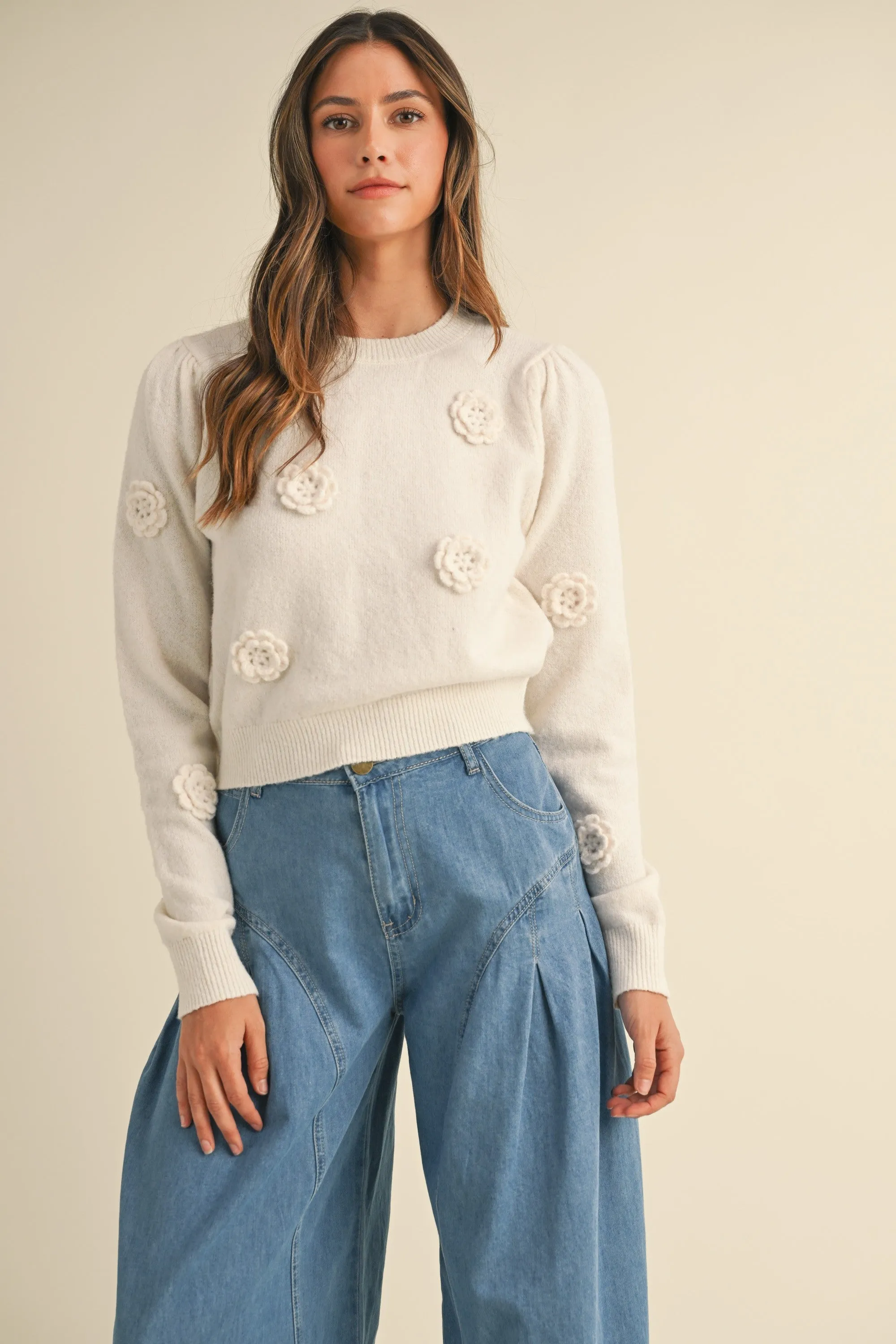 The Maribel Floral Sweater Top sold by Thread & Seed