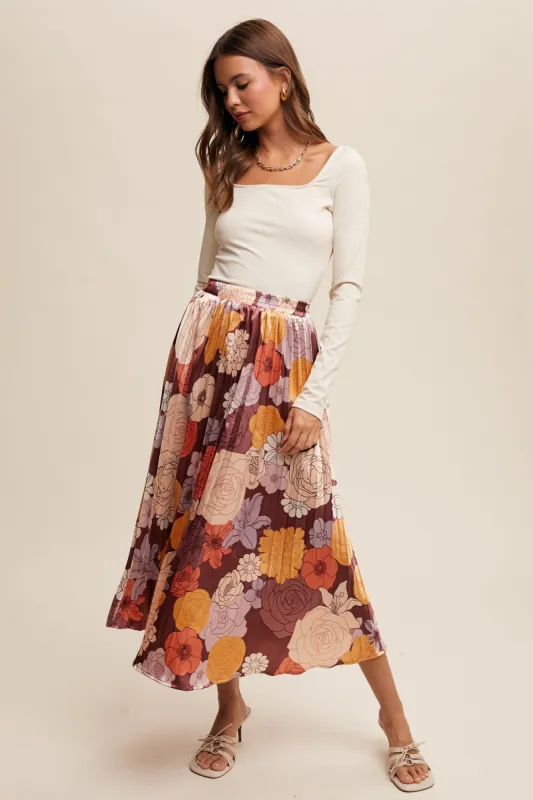 The Alma Floral Pleated Maxi Skirt sold by Thread & Seed