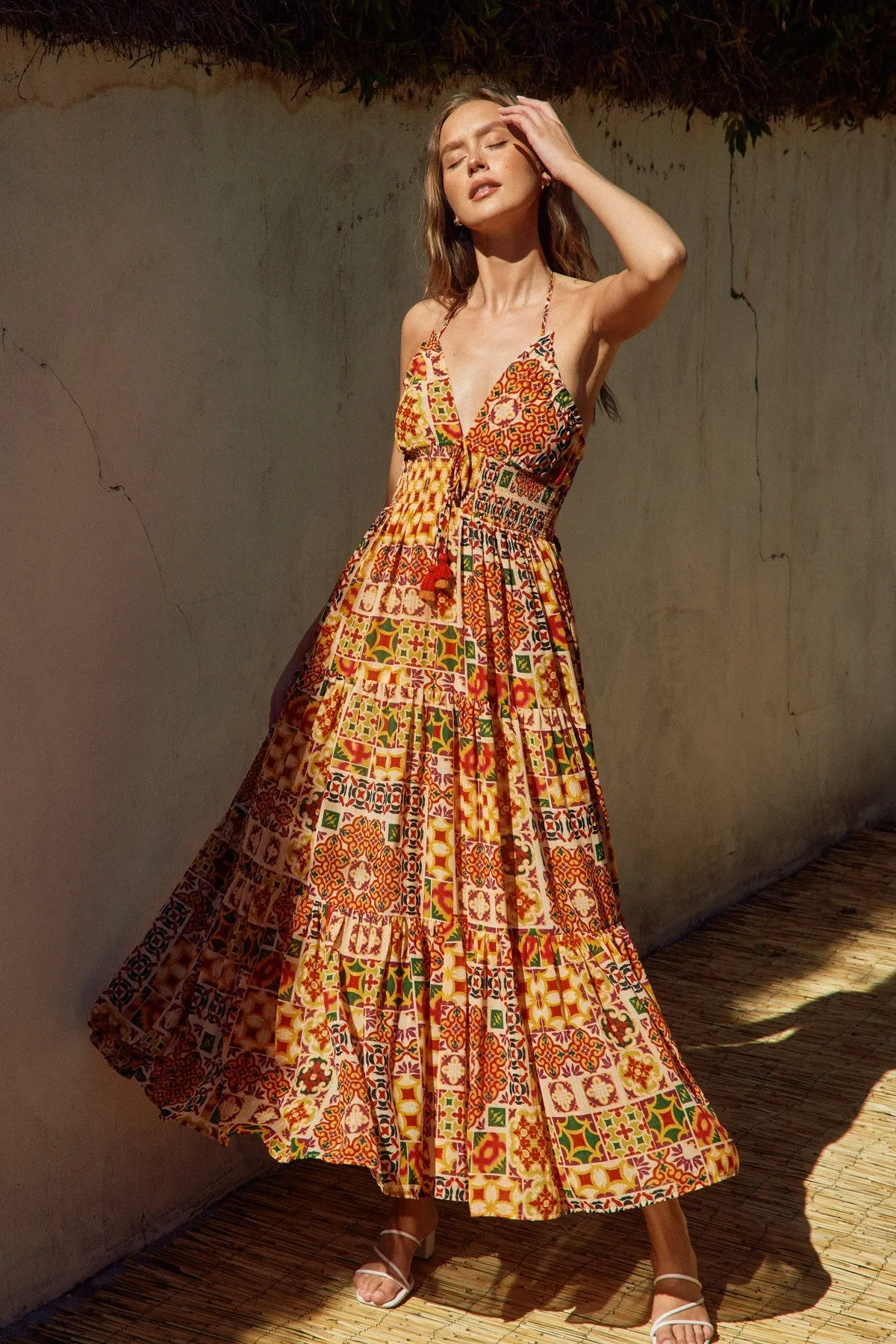 The Dani Halter Maxi Dress sold by Thread & Seed