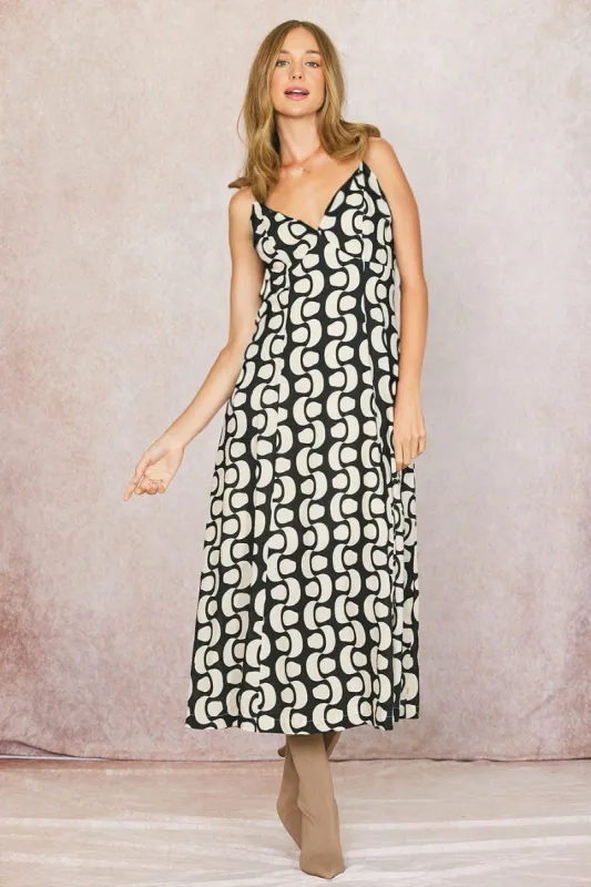 The Blythe Black Open Back Maxi Dress sold by Thread & Seed
