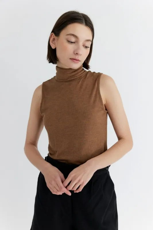 The Marian Sleeveless Turtleneck Top sold by Thread & Seed