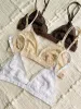 The Basic Gracie Lace Triangle Bralette sold by Thread & Seed
