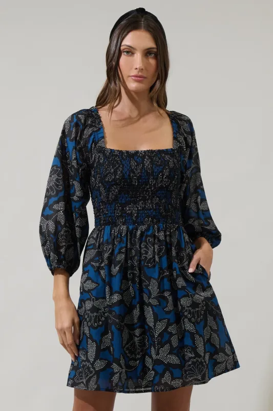 The Livia Floral Smocked Mini Dress sold by Thread & Seed