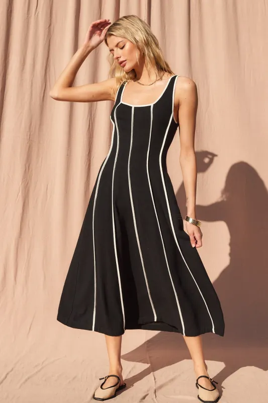 The Sahar Linen Midi Dress sold by Thread & Seed