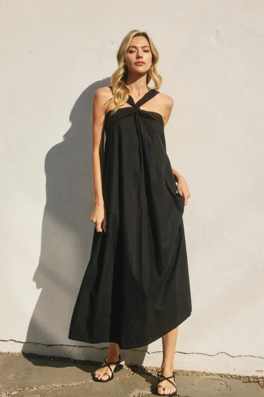The Angeni Black Halter Maxi Dress sold by Thread & Seed