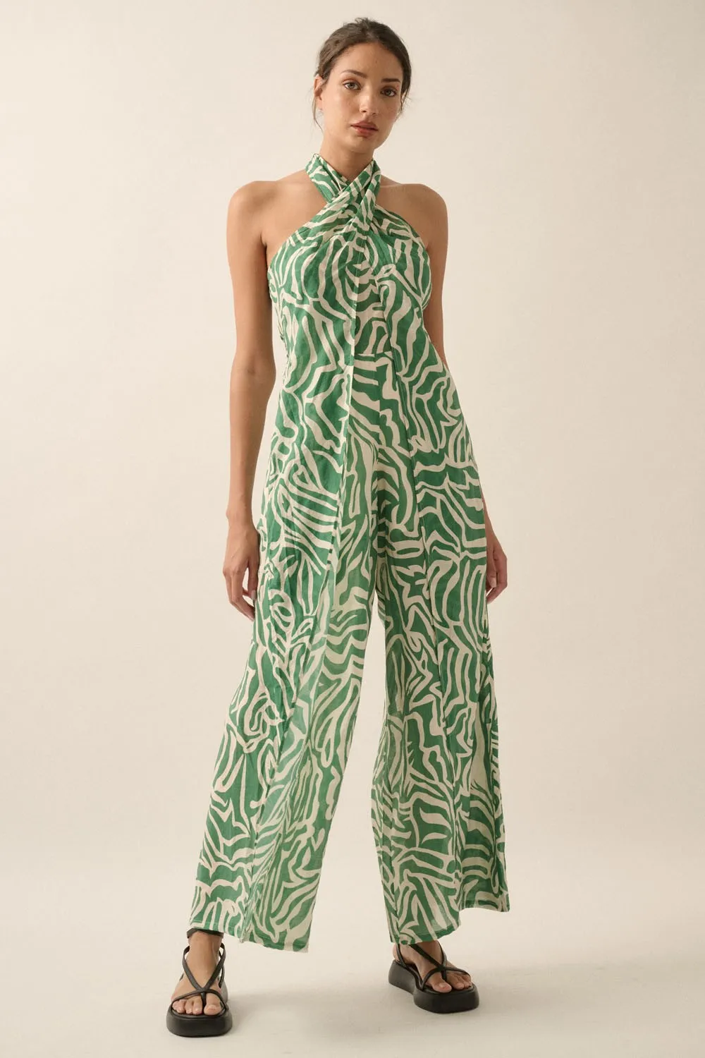 The Avayah Abstract Convertible Halter Jumpsuit sold by Thread & Seed