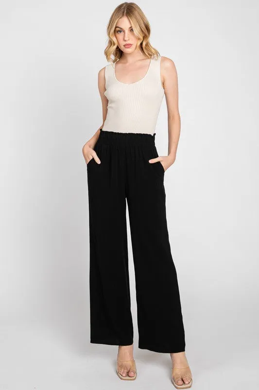 The Rayna Black Linen Wide Leg Pants sold by Thread & Seed