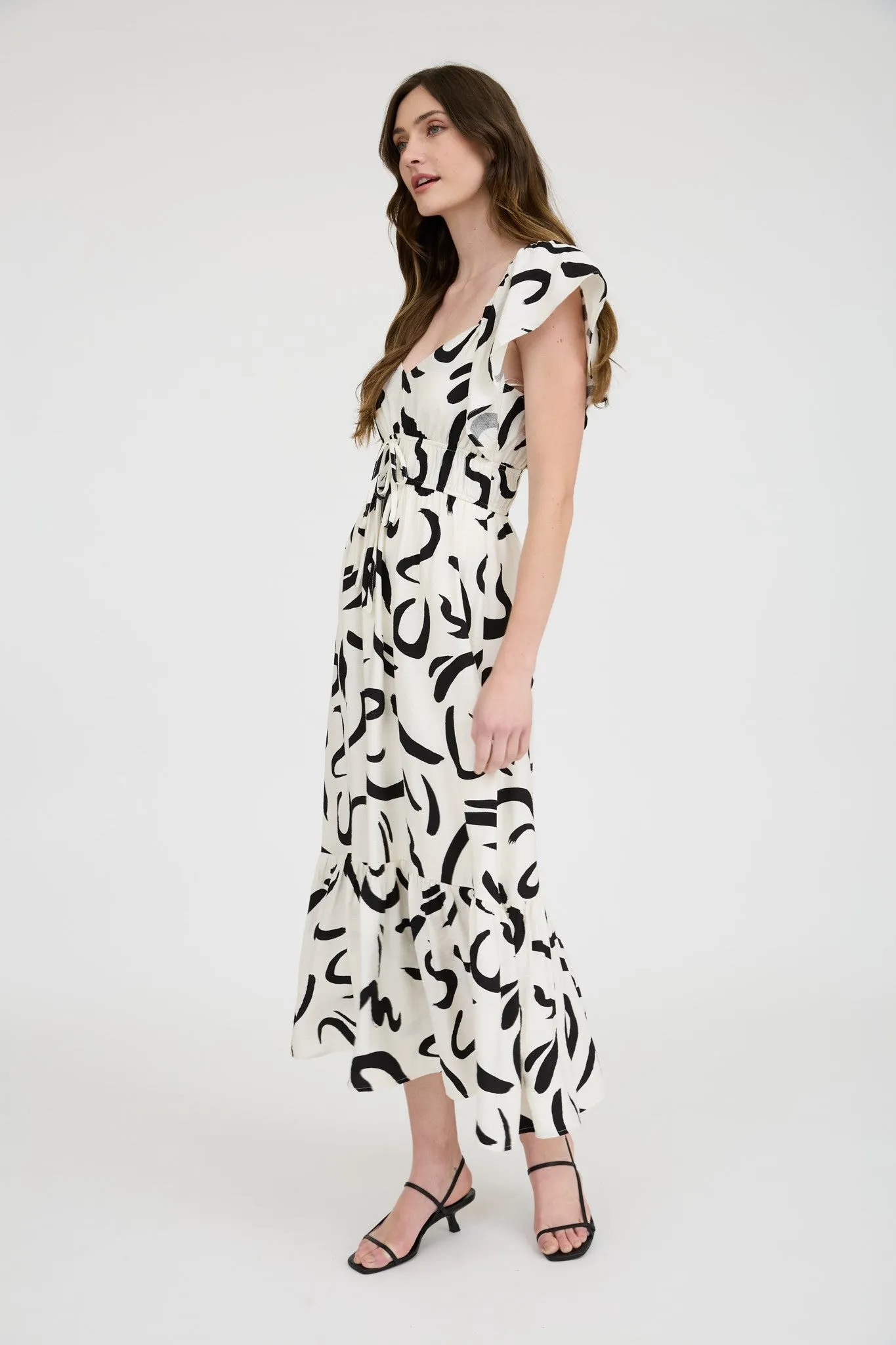 The Lydia Ivory Abstract Flutter Sleeve Dress sold by Thread & Seed product image thumbnail 3