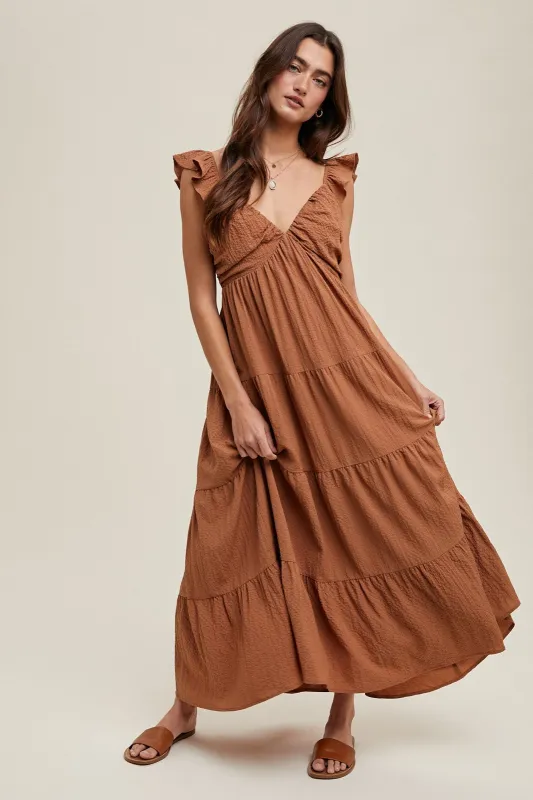The Nora Flutter Sleeve Dress sold by Thread & Seed