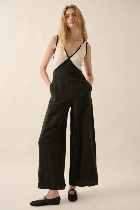 The Angi Black Colorblock Jumpsuit sold by Thread & Seed