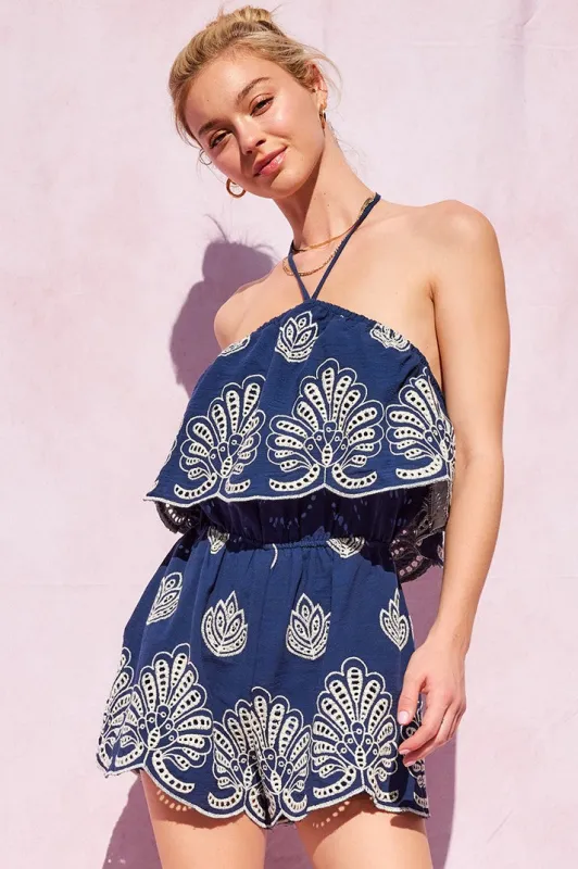 The Nerina Navy Halter Embroidery Romper sold by Thread & Seed