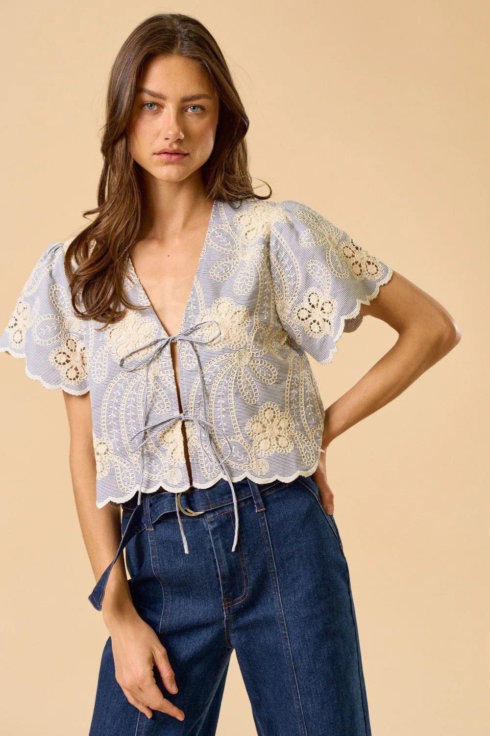 The Lila Floral Embroidery Scalloped Top sold by Thread & Seed