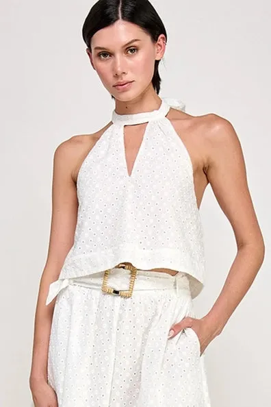The Felicity Eyelet Halter Top sold by Thread & Seed