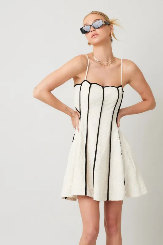 The Ivy Embroidered Contrast Mini Dress sold by Thread & Seed