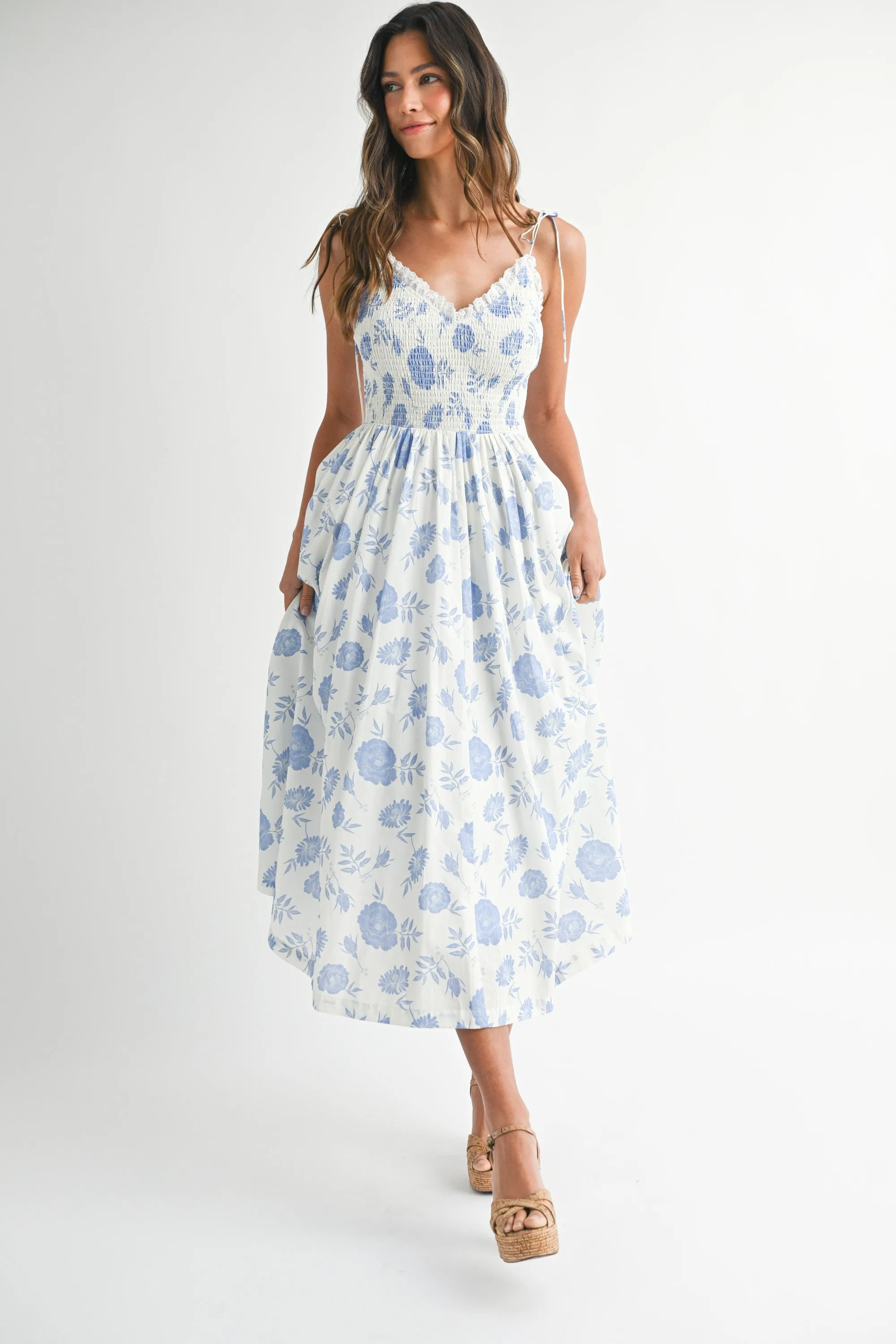 The Aurelia Floral Smocked Midi Dress sold by Thread & Seed