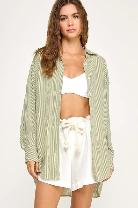 The Gorgi Green Oversized Buttondown Top sold by Thread & Seed