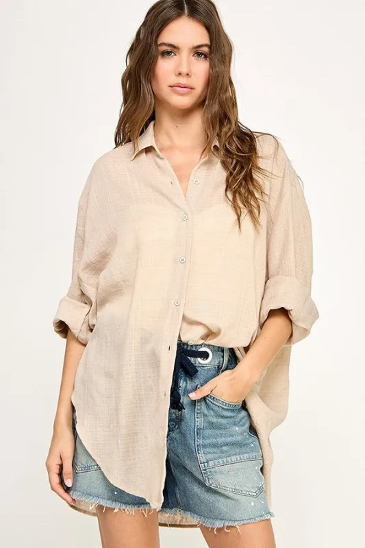 The Christa Beige Oversized Buttondown Top sold by Thread & Seed