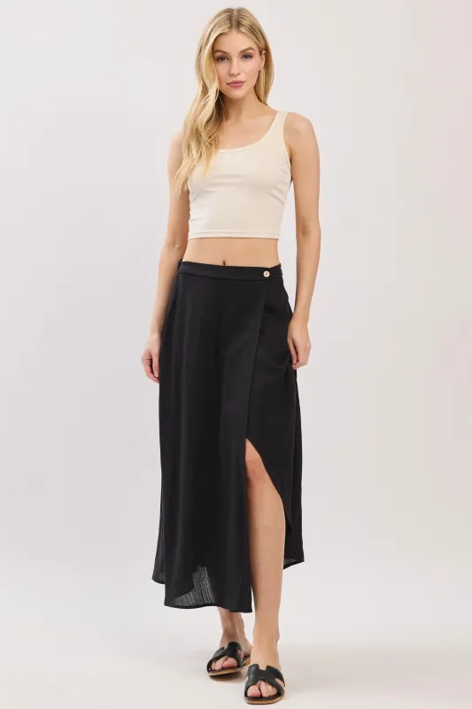 The Emelyn Black Wrap Midi Skirt sold by Thread & Seed