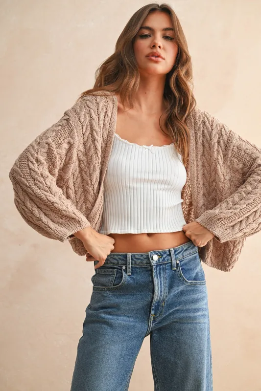 The Leslie Tan Cable Knitted Cardigan sold by Thread & Seed