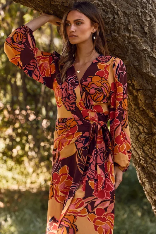 The Julieta Floral Wrapped Midi Dress sold by Thread & Seed