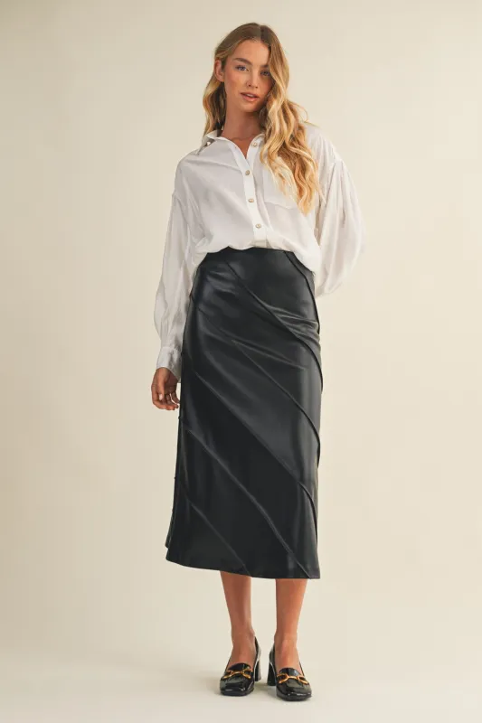 The Giselle Spiral Seam Midi Skirt sold by Thread & Seed