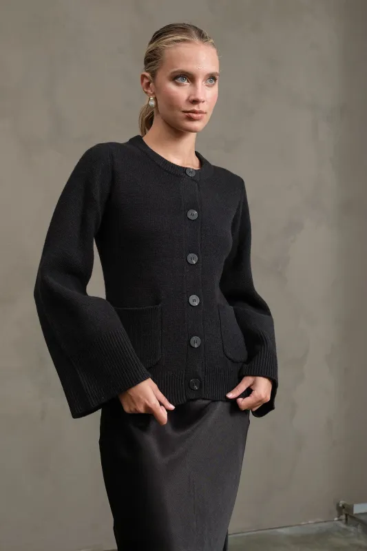 The Kloey Black Bell Sleeve Cardigan sold by Thread & Seed