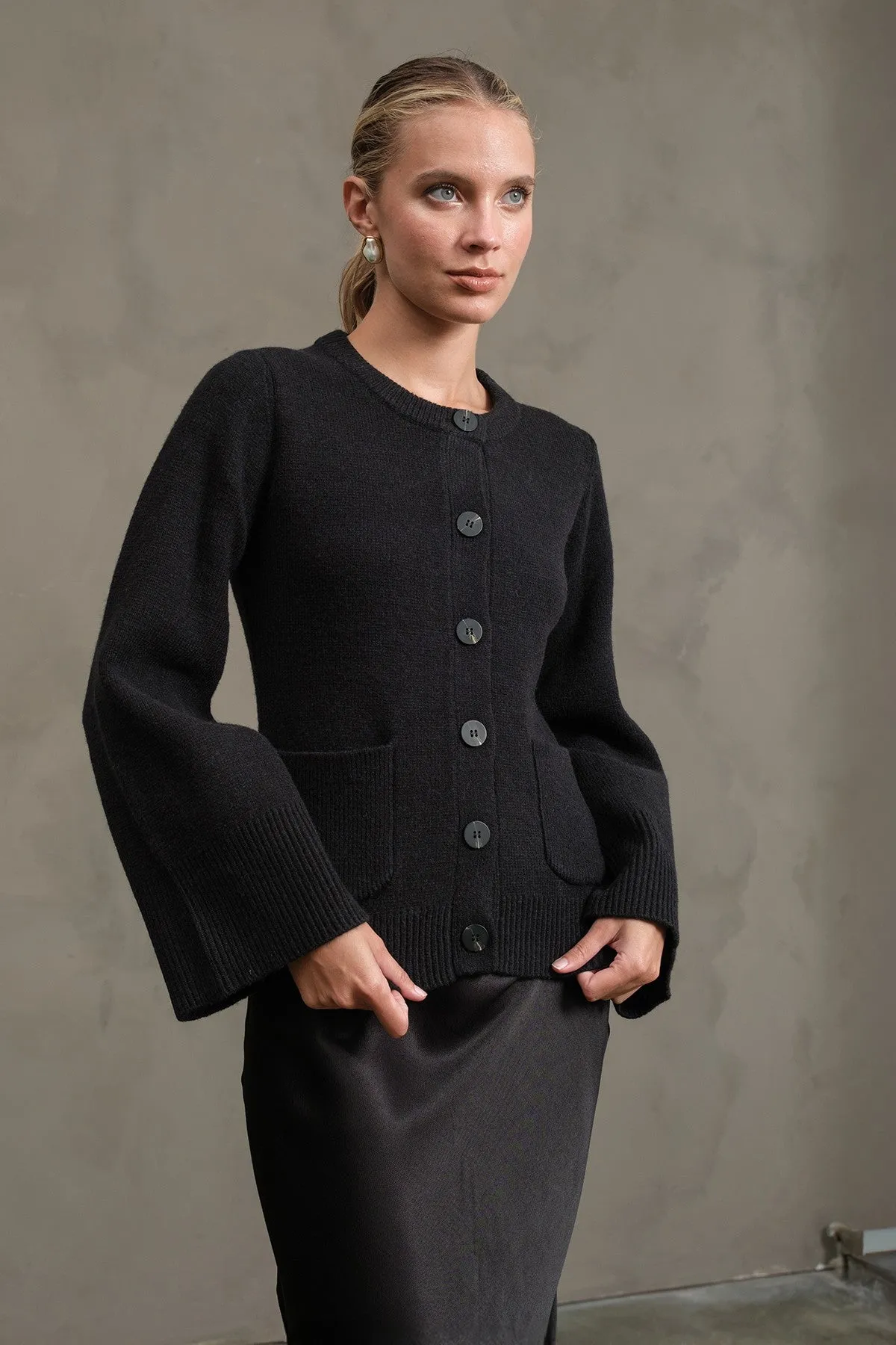 The Kloey Black Bell Sleeve Cardigan sold by Thread & Seed
