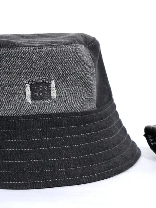 1ER MAI - Reversible bucket hat in black grey jeans patchwork/black sold by Odeyalo