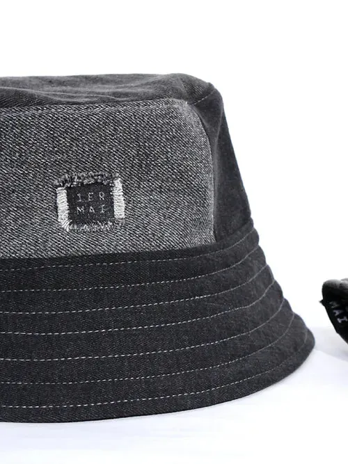 1ER MAI - Reversible bucket hat in black grey jeans patchwork/black sold by Odeyalo