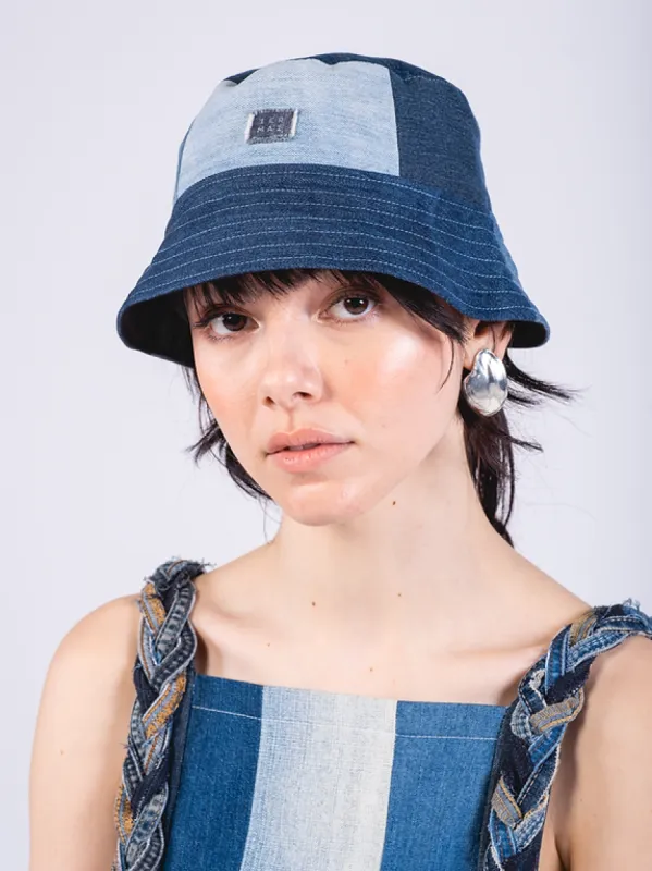 1ER MAI - Reversible bucket hat in blue jeans patchwork/black sold by Odeyalo