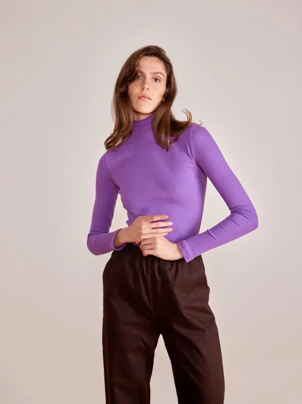 ADAMO purple mock neck sold by Odeyalo