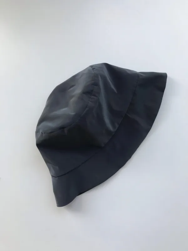 CHASSE ET PÊCHE iridescent bucket hat sold by Odeyalo